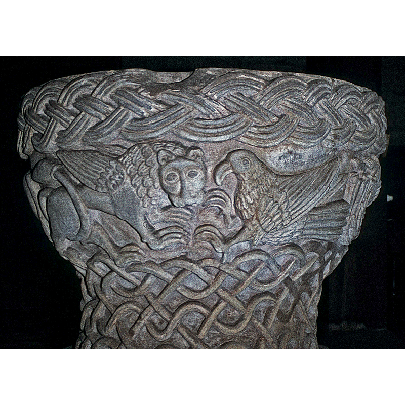 the heads of Mark's lion and John's eagle -- notice the notch on the upper rim