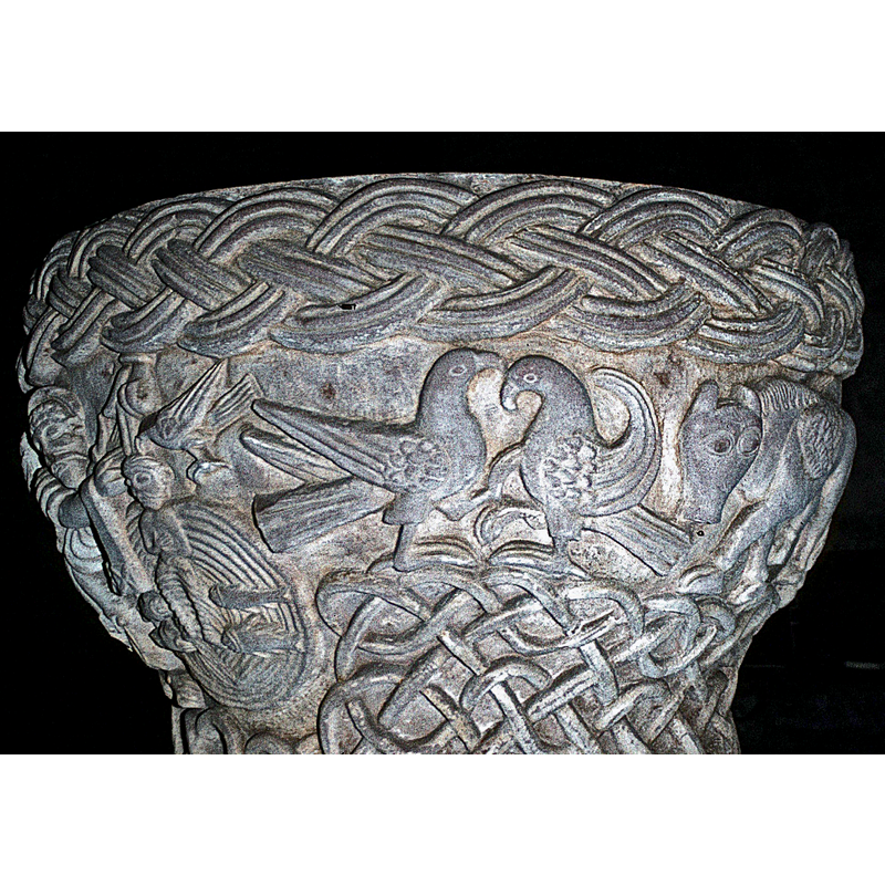 partial view of the Baptism of Christ scene on the left; two facing doves (?) in the centre; St. Luke's winged ox on the left