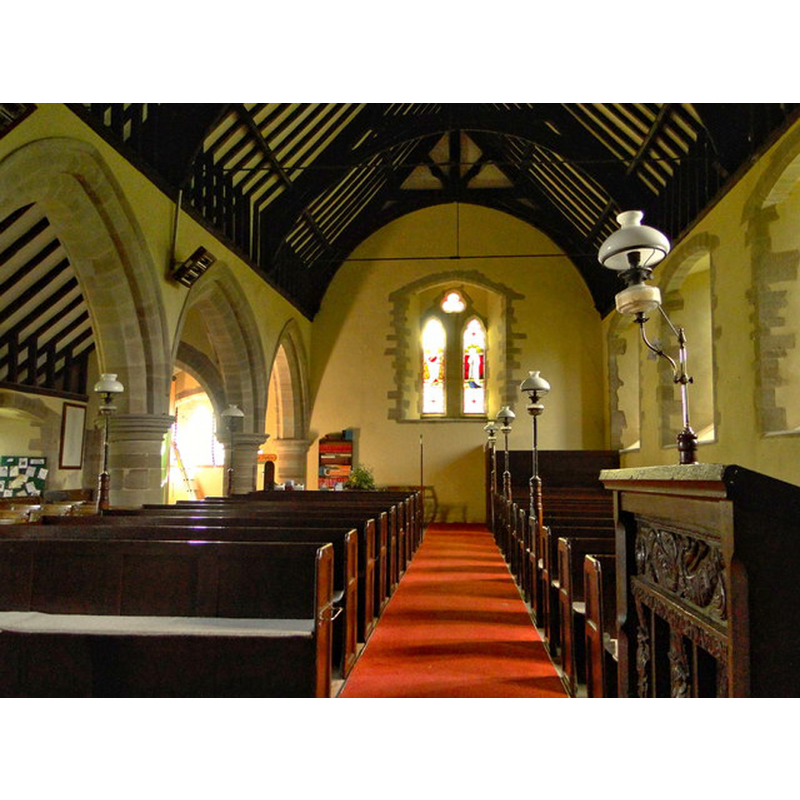 Source caption: "St Peter, Stoke Bliss. The nave, with fine pews of 1852-4, complete with original oil lamps and standards - a considerable rarity."