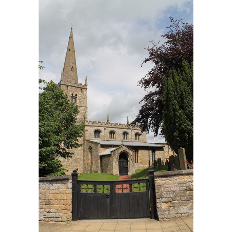 Source caption: "Originally an 11th C. church with west tower from 11th and 12th C. 13th century font and inner south doorway, 14th century south aisle and south porch, 15th century seating and chancel plus new nave roof and clerestory, tower parapet and spire."