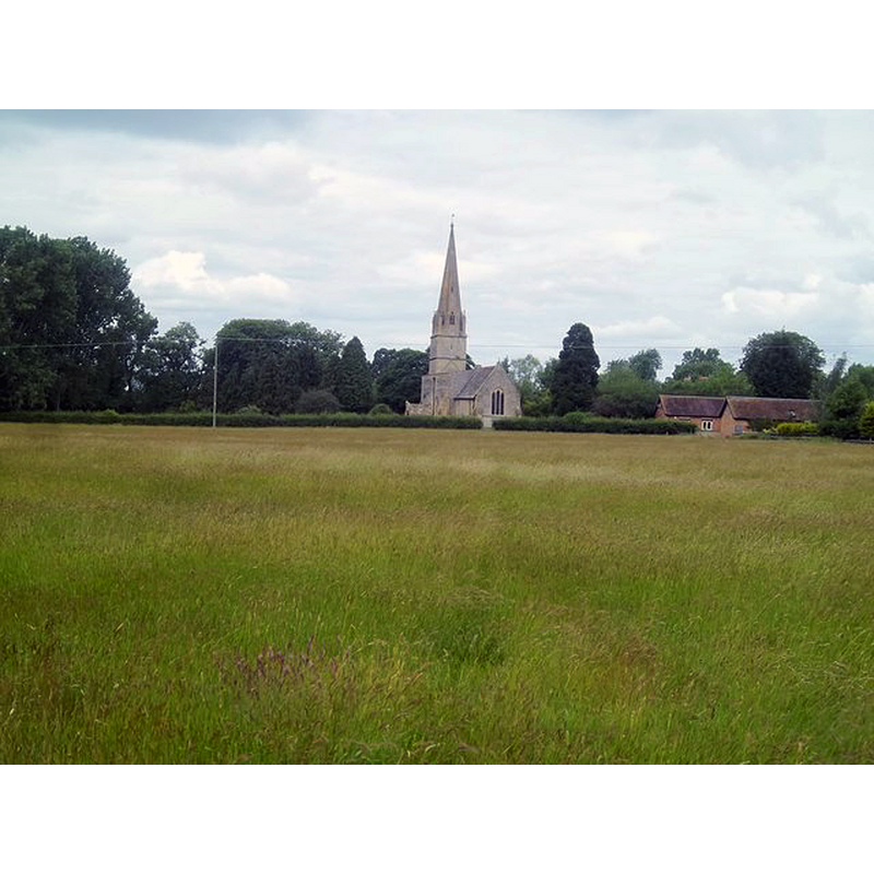 Source caption: "There is the faintest trace of a footpath across this field. The church of St Ecgwin and a part of Manor Farm are in the background."