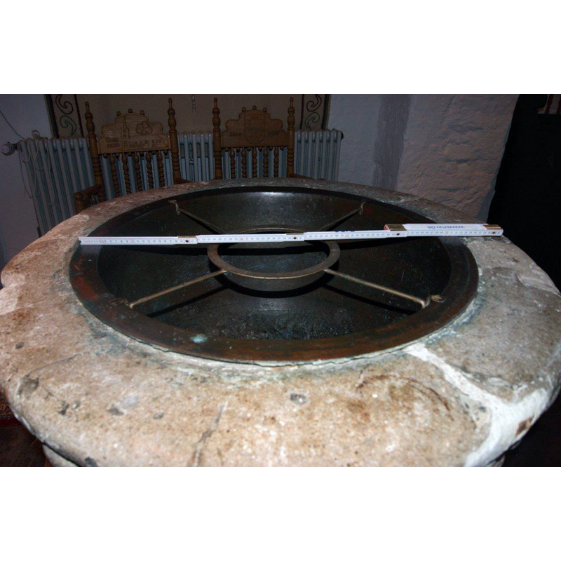 showing the metal insert with the welded frame to support the baptismal dish, a common addition to medieval fonts in the North