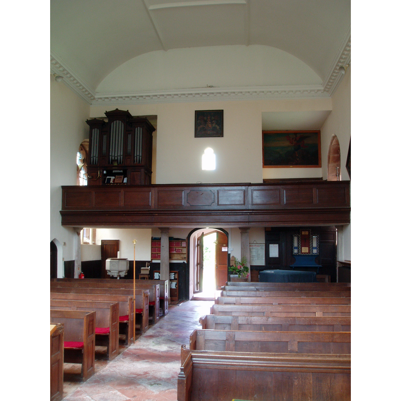 Maxtoke St. Michael's church -- the Victorian font is partially visible at the back [west] end, left [south] side, beneath the gallery -- the top of the reddish Georgian font is visible just across, behind the right [north] bank of benches
