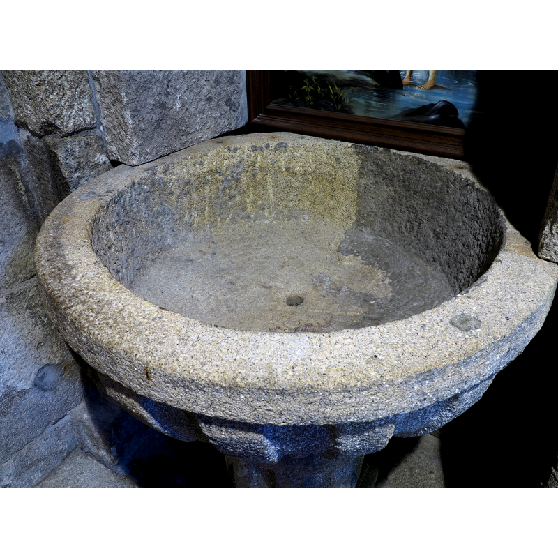 notice the plugged spot in the upper rim, likely the anchorage point for an earlier font