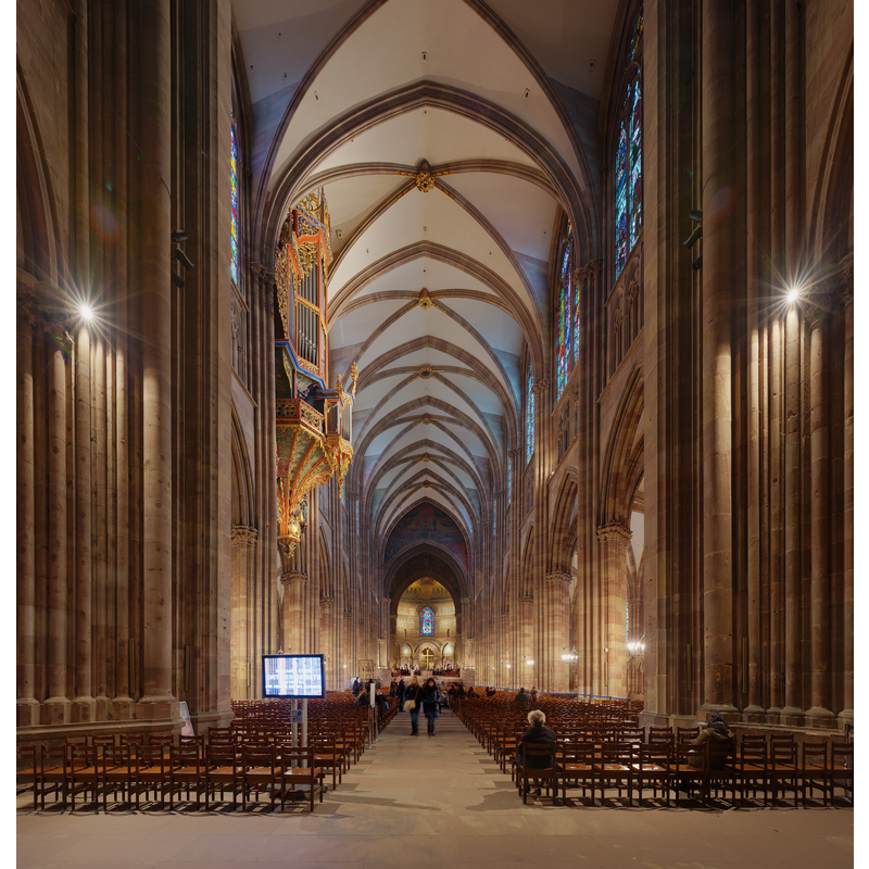 Source caption: "Strasbourg Cathedral, as viewed from the rear looking down the central isle. The isle is not actually central to the pillars however, so in effect the view is slightly left of the true centre of the Cathedral."