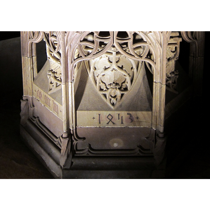 two of them: Roman numerals on the left; Gothic lettering on the front
