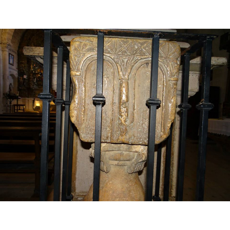 at the top of the baluster-shape of the upper half of the stem