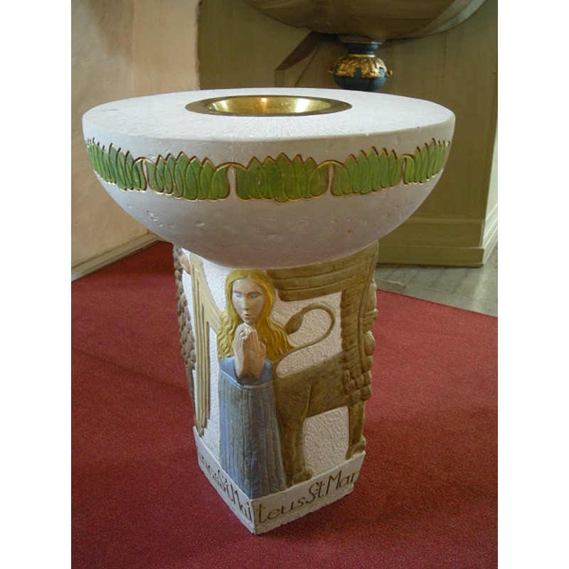 the modern font; the base showing three of the four Evangelists' symbols