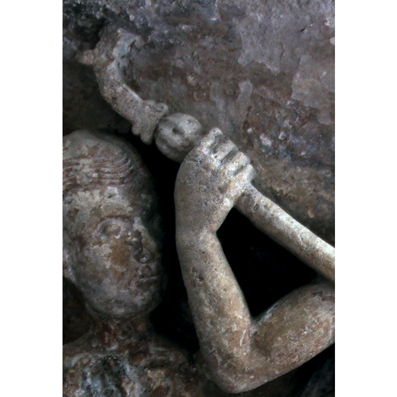 Christ's armed right arm; head of rescued soul