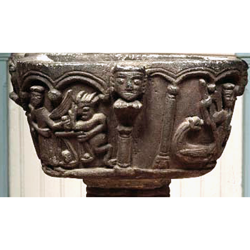 in the second of the 'spandrels' or concave recesses of the quatrefoiled basin; atop one of the shorter columns of the arcade; to the left is part of the weiighing of the souls scene; to the right is St. Michael's fighting the dragon