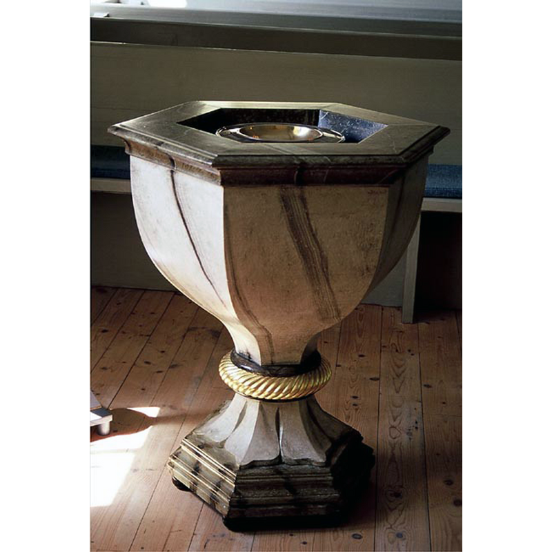 the 18th-century (?) font in use in this church