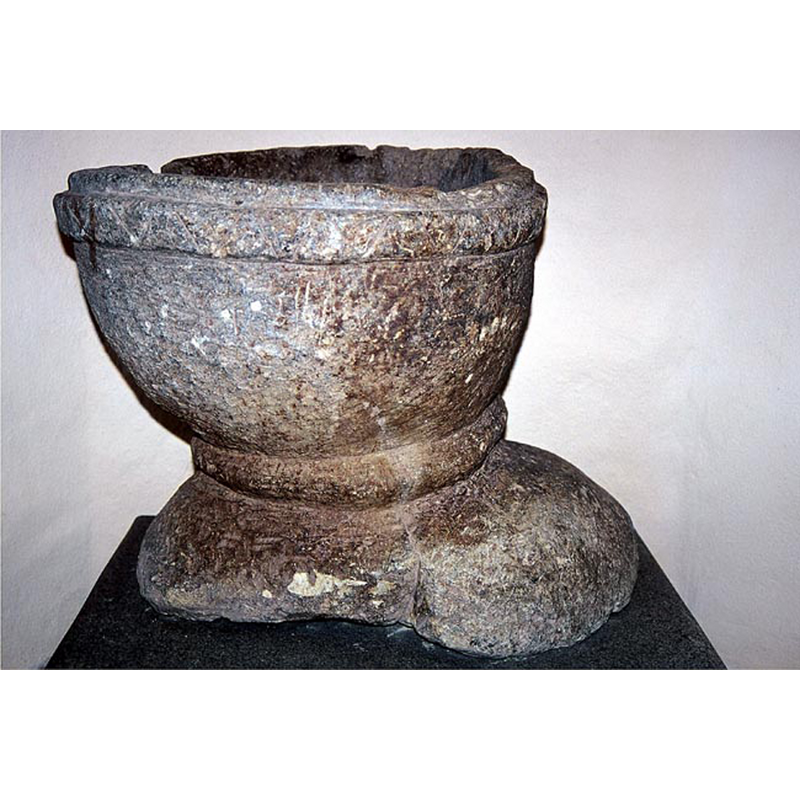 the medieval soapstone font relegated to the porch [cf. FontNotes]