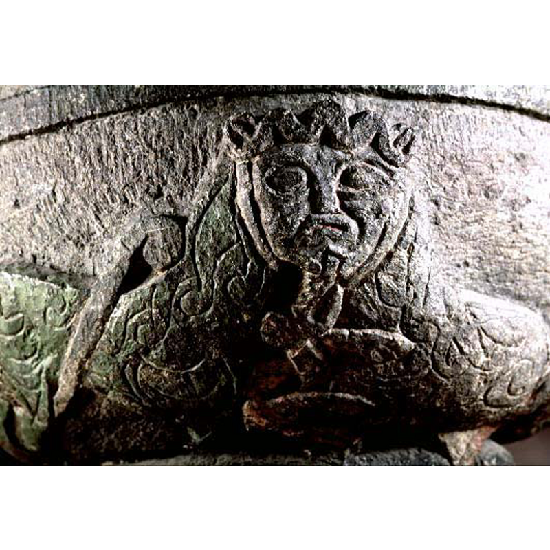 the head is human, but the two bodies are feline; there appears to be prey in its front paws -- SHM's photo caption reads: "bicorporates"