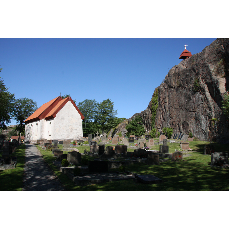 the bell-cote is partially visible atop the rocks on the right