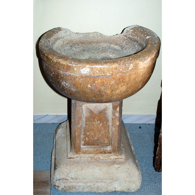 a late-date stoup by the south entranceway