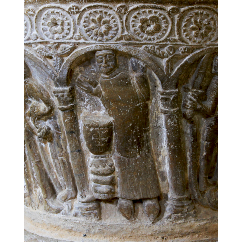 not clear whetehr they were intended to appear in all the little circles that occupy the 'spandrels' of the larger circled floral motifs; one here, above, to the left, has the Maltese cross clearly carved in it; the one to the left has a rougher incision