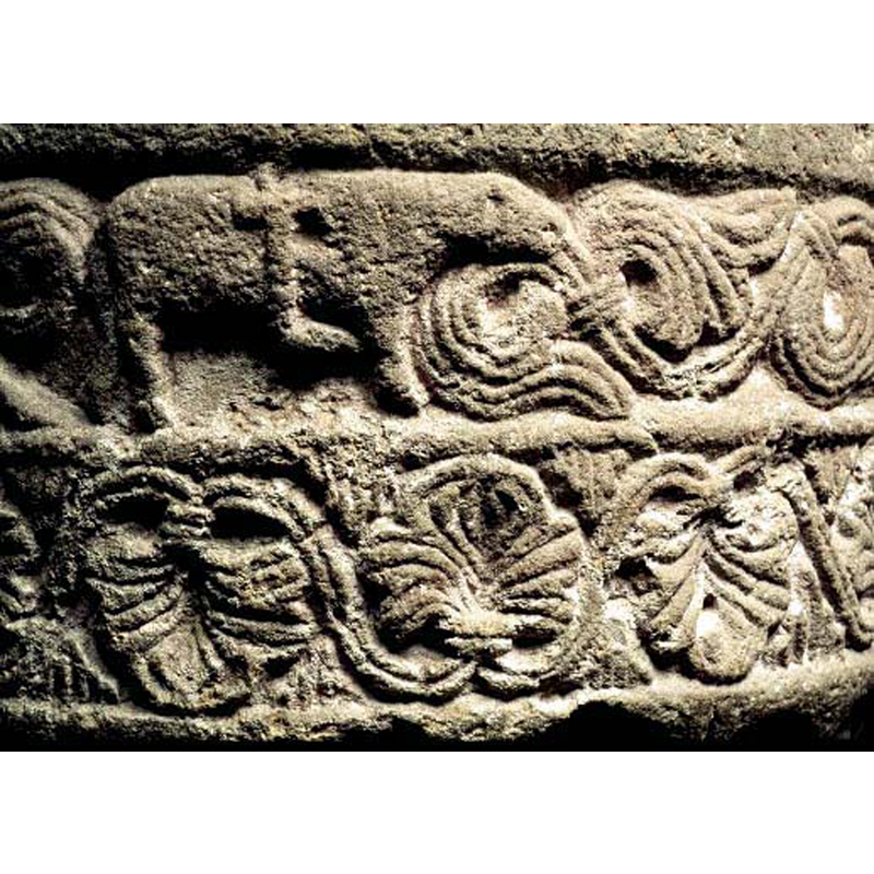 on the upper register of the basin, back side(?)