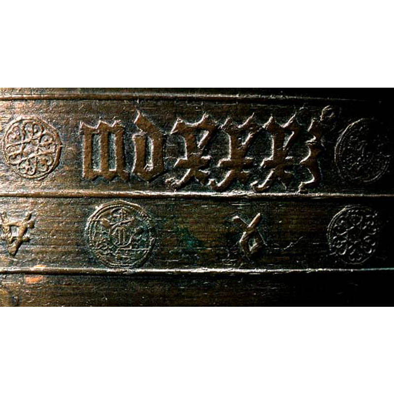 several of them, rounded, alternating with other unidentified Runic-like symbols; do some of the roundels contain other symbols?