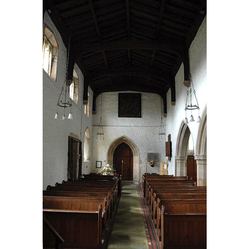 the top of the modern font, with a floral arrangement on top, is visible at the far [west] end, left [south] side