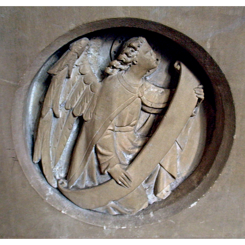 one of the four Evangelists' symbols on the sides of the modern font