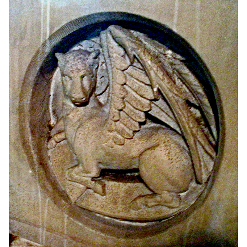 one of the four Evangelists' symbols on the sides of the modern font