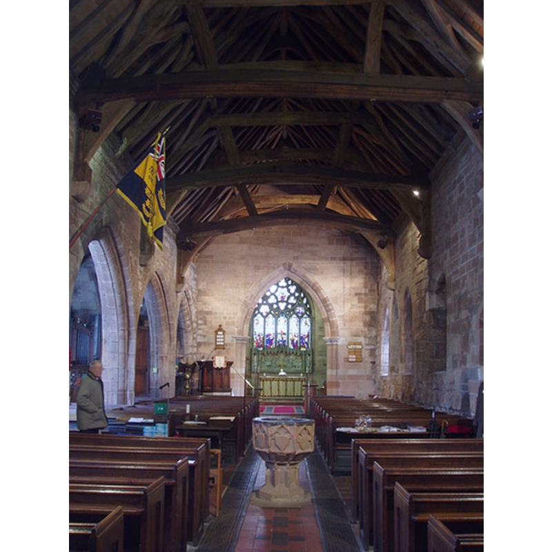showing the baptismal font in the centre aisle