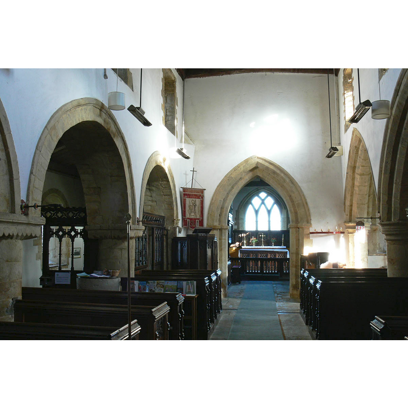 the top of the old font and its cover are visible on the left [north] side of the nave, centre aisle