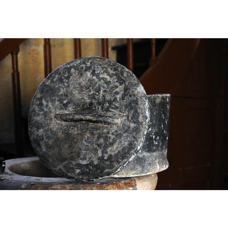 the former lead holy-water tank and its lid are now used as lining for the basin of the baptismal font