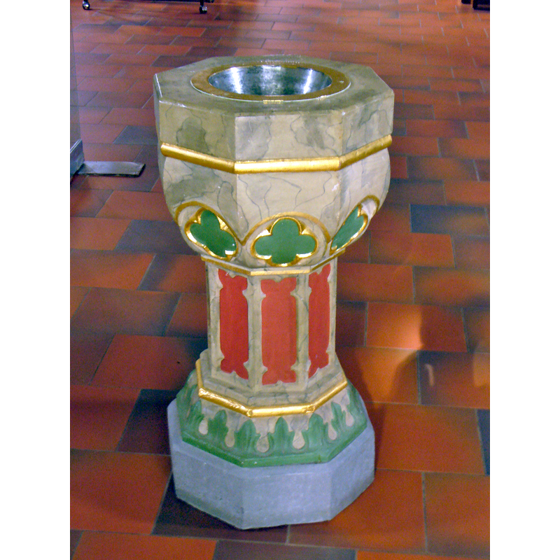 a late-date holy-water stoup located at the west end of the centre aisle