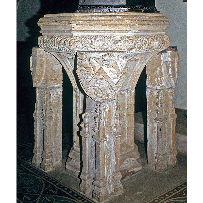 three (?) on each of the columns of the base