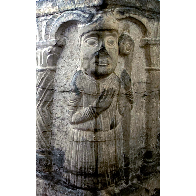 wearing a mitre and holding a bishop's staff in his left hand, the right hand in a benediction pose -- on the northwest corner of the basin [NB: orientation is approximate]