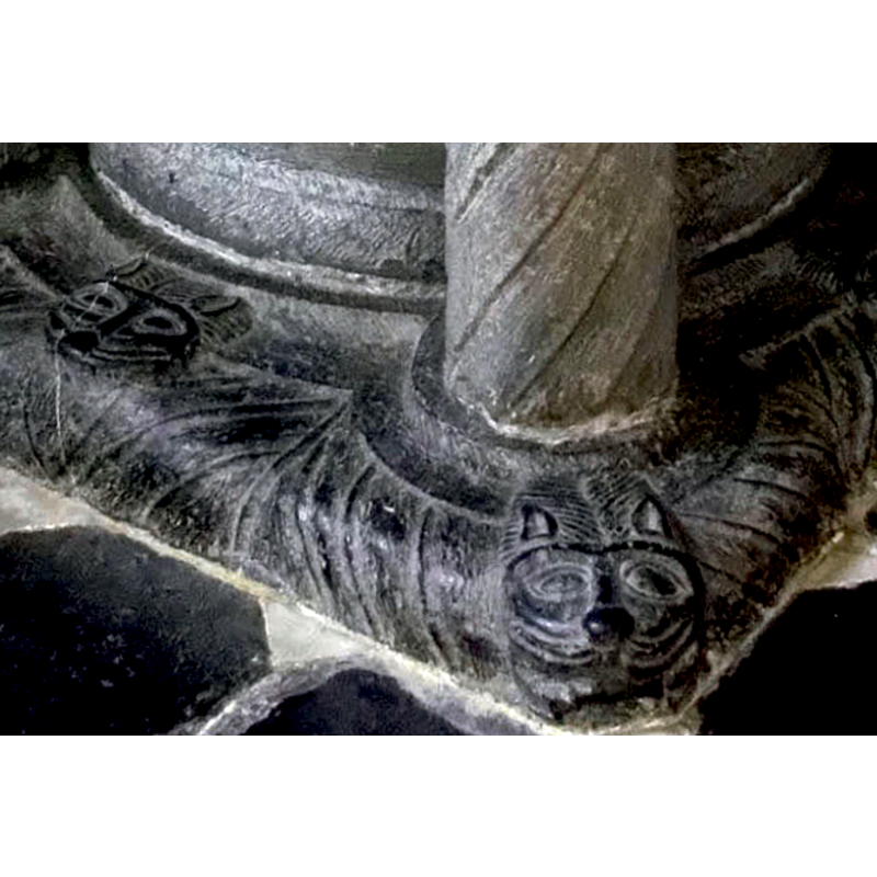 forming the bases of the five supporting columns of the base