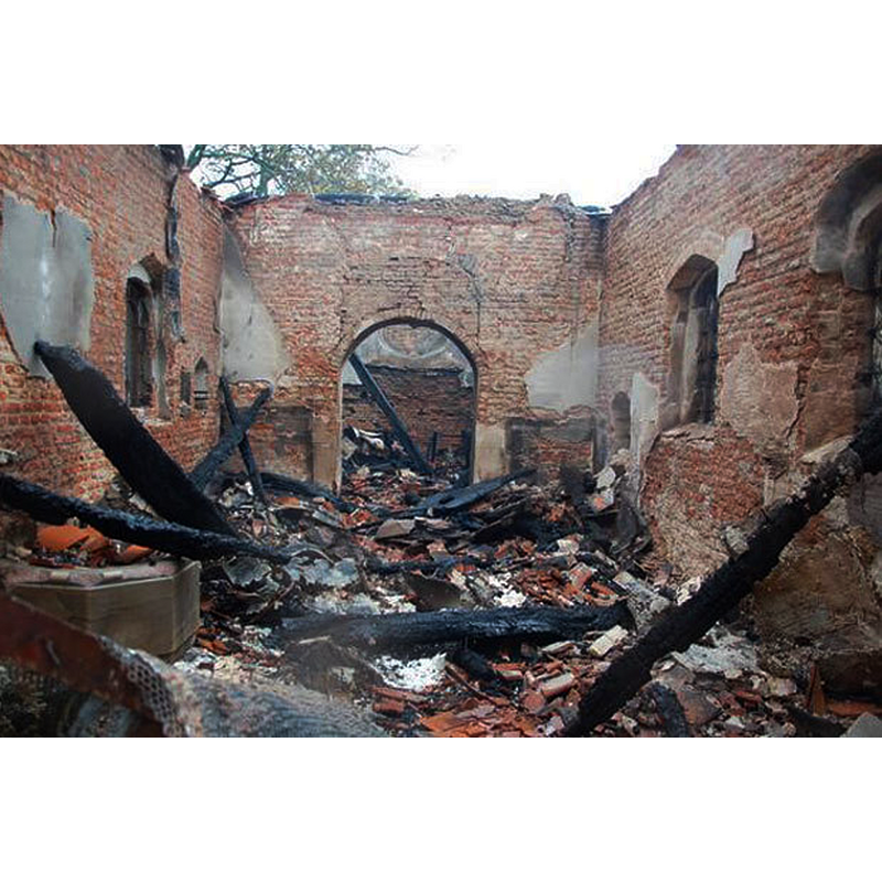 the church in 2004 -- Source caption: "St George, Goltho. The church of St George is reached through a large field. [...] The site was inhabited for 900 years and the little church is all that is left. It stands on the site of substantial stone-built church. The nave is traditionally thought to have been built by the Grantham family when they purchased the estate in the 1530s, the chancel being added some 70 years later."