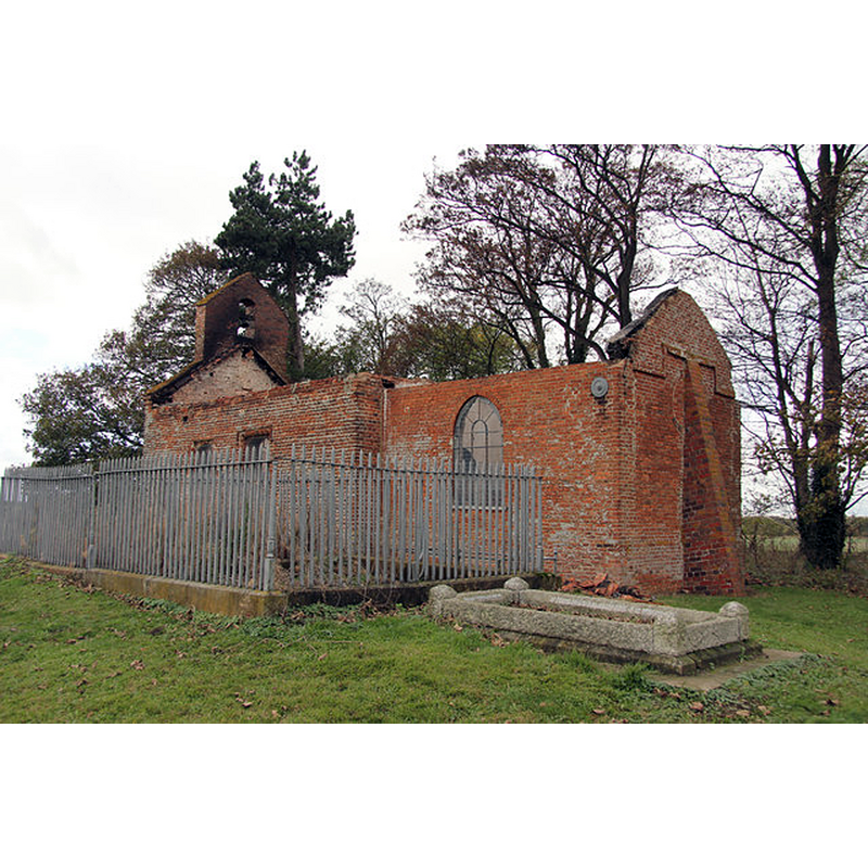 Source caption: "St.George's church [...] five days after the disastrous fire of 21st October 2013."