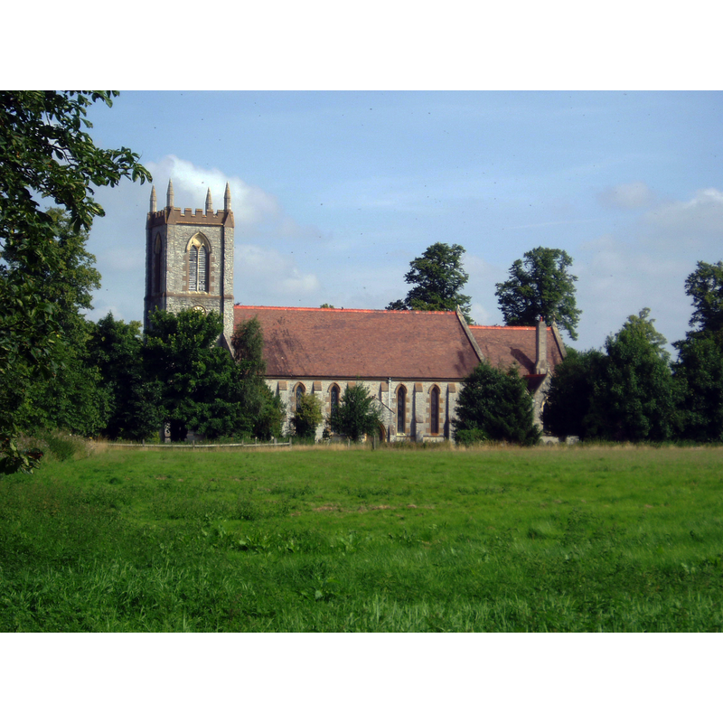 Source caption: "The church of St James at Alveston was built in 1839 to the designs of W.Walker to replace the much smaller ancient building at the other end of the village (of which only the chancel now survives). The interior is spacious under a wide hammerbeam roof and dominated by some fine frnishings, particularly the brightly coloured Arts & Crafts rood-screen and panelled pulpit, presumably the work of Temple Moore who was responsible for the nearby vicarage c1908. There is stained glas by Worcestershire architect Frederick Preedy in the 5 lancets of the east window and the small rosette in the west tower."