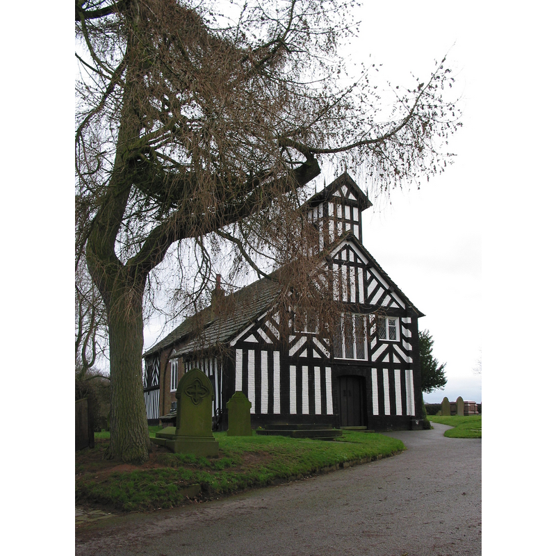 Source caption: "All Saints Siddington. The parish church with earliest known reference in 1474. The timber-framed structure was replaced in the eighteenth century by the present brick-built structure."