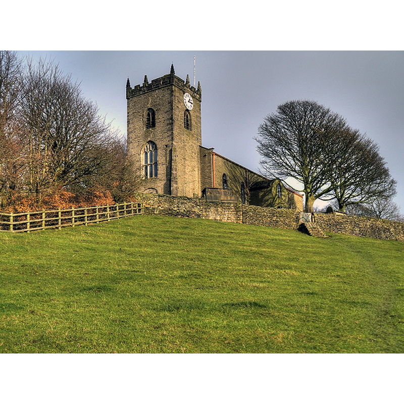 Source caption: "The Parish Church of St Thomas was built on the crest of a hill overlooking the village of Mellor. [...] The course rubble tower dates from the 15th century and is built on 12th century foundations; the rest of the church was rebuilt in the early 19th century."