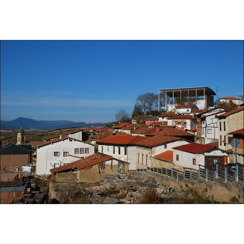 the tower of the church is visible on the left hand side of the image; there is no visible trace here of the town walls and the Iglesia de San Cristobal, which was built into them