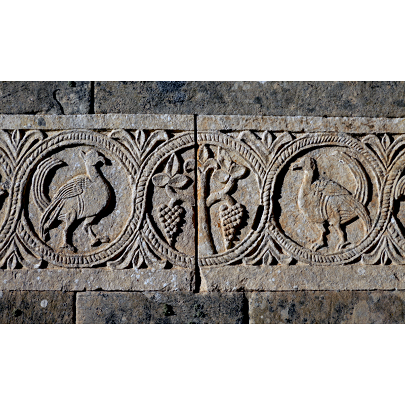 one of the carvings on the external walls of the church