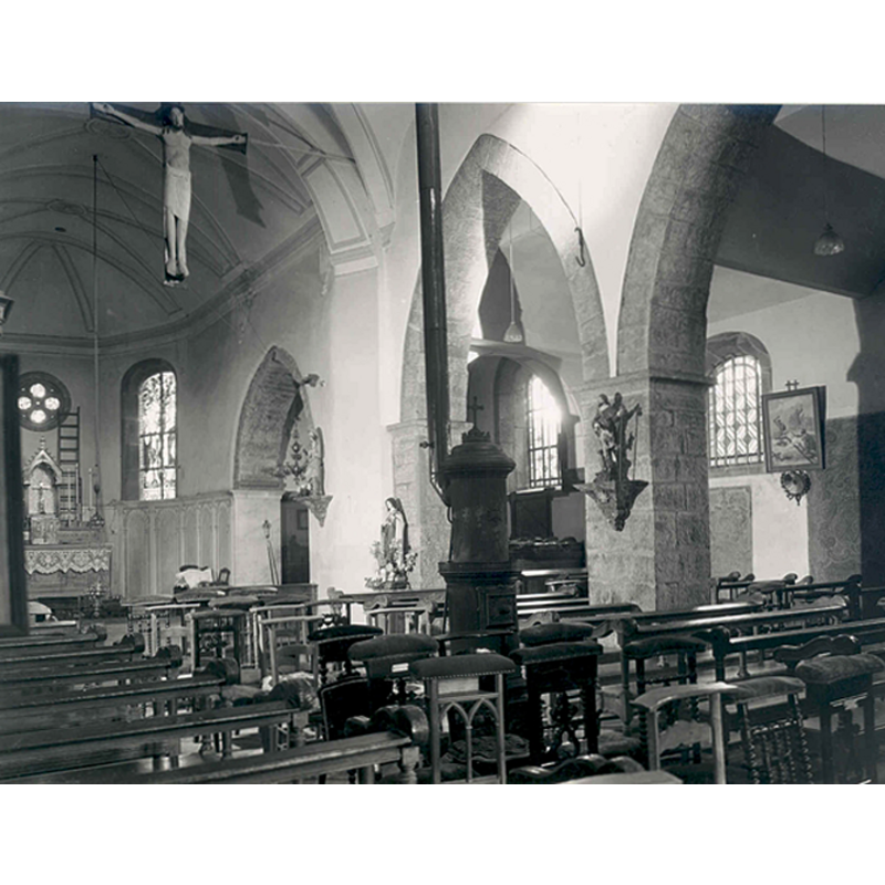 the Romanesque rood at the chancel arch, above
