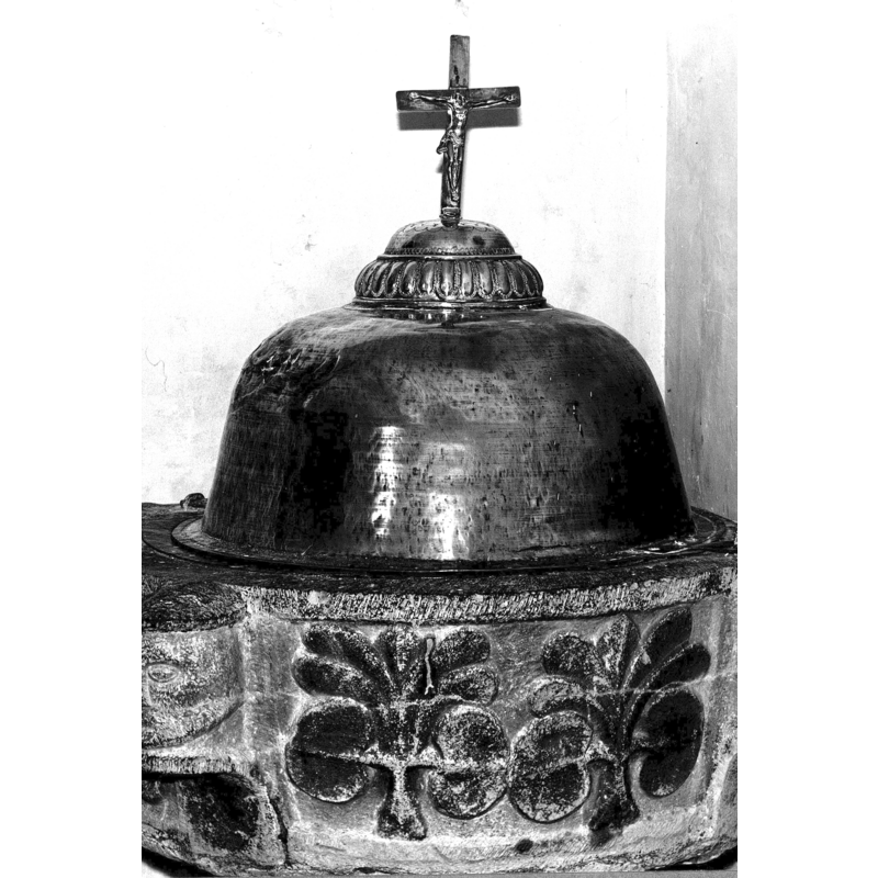 made of brass and dated in this source to the 17th century