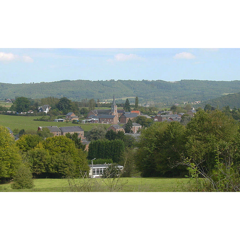 the new church and the village of Hour, in the municipality of Houyet
