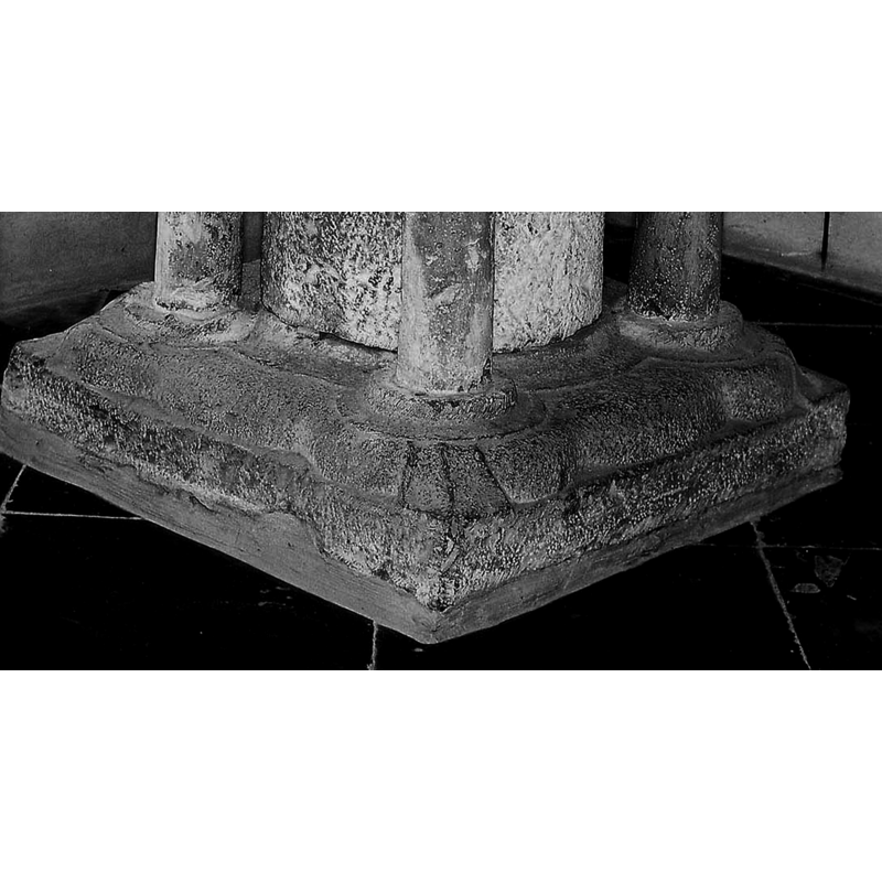 at the angles of the lower base