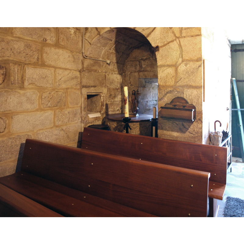 in an alcove at the southwest corner of the nave
