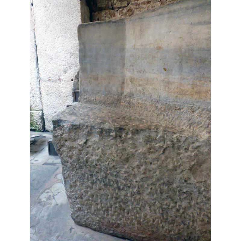 the unfinished surface of the lower half of the font shows the depth to which the font would have been buried; the upper part, finished and polished, would stay above ground