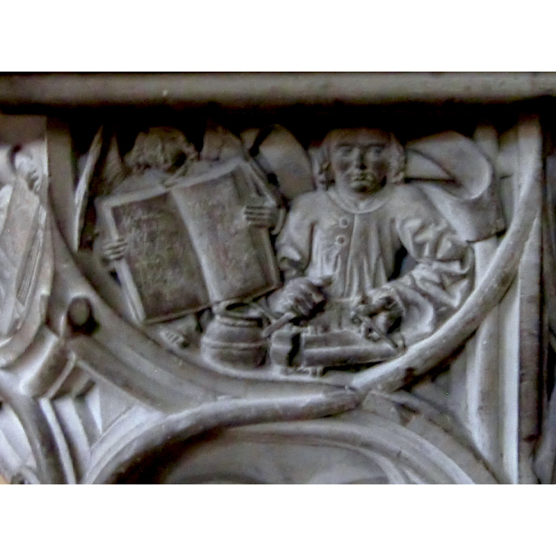 Matthew himself is shown  in the foreground, with an angel holding a book in the background