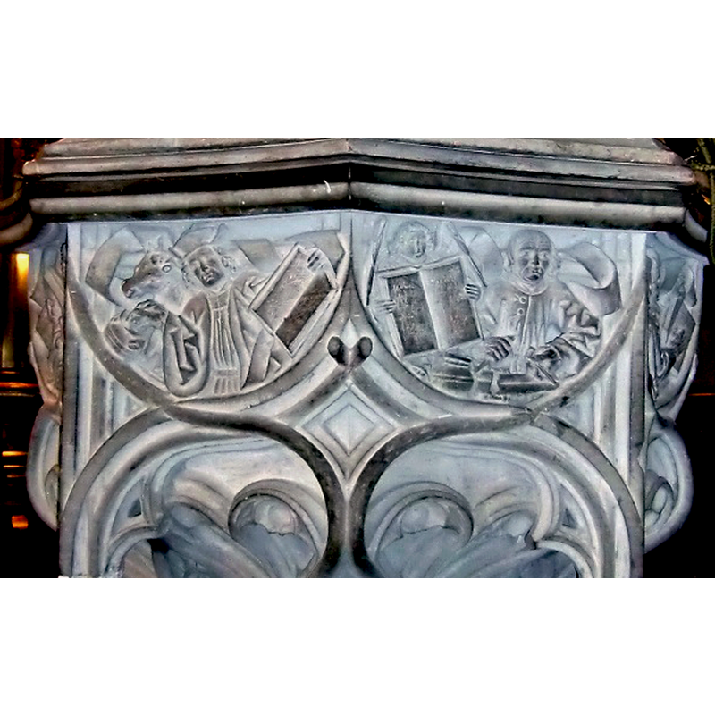 Luke himself is shown  in the foreground holding a book, while his symbol appears in the background