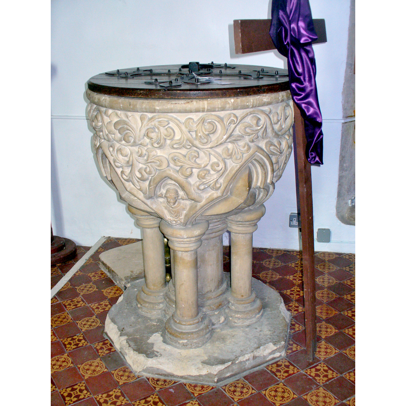 with fleur-de-lis in them, but one of the arches houses a bust, exactly as in the font at Leicester All Saints'