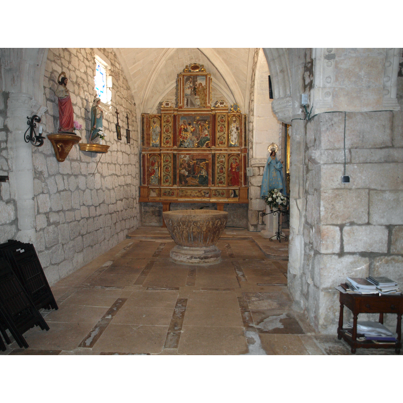 with the font near the altar, obviously not its original location