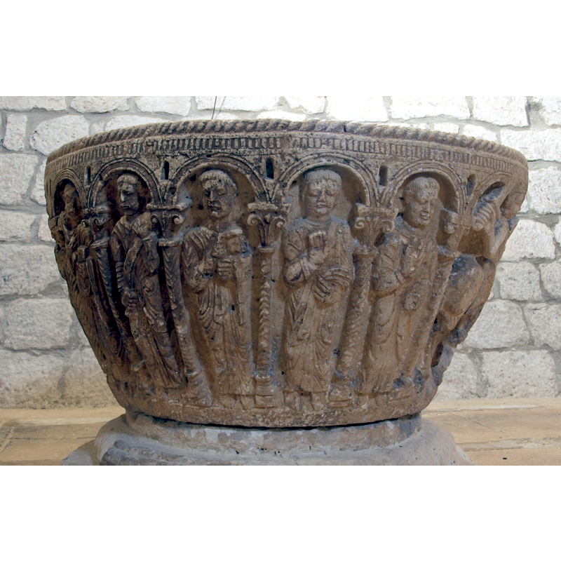 on the west side of the basin [NB: orientation is approximate] --  there is no other clear identification symbol besides Peter's keys; at least one of the figures has the type of haircut that often identifies clerics